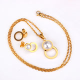 Steel/golden figure 8 shape with pearl + wisp round jewelry set