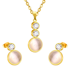 Gold/steel color sticking cat's eye stones + two small round cakes topped with diamonds jewelry set