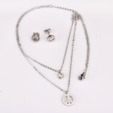 Steel/golden double chain pendant jewelry set with diamonds in the form of a round bridge stand + diamonds on one chain