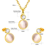 Gold/steel color sticking cat's eye stone + a small round cake with diamonds on top jewelry set