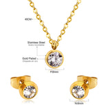 Gold/steel round jewelry set with diamond in the center