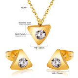 Gold/steel triangle jewelry set with diamond in the center