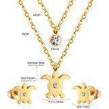 Gold/steel double chain pendant jewelry set in the shape of a small sea turtle with diamonds