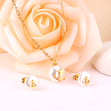 Steel/golden white pearl + anchor cut jewelry set