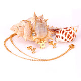 Gold/steel double chain pendant jewelry set in the shape of a small sea turtle with diamonds