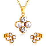 Steel/golden four-flower white pearl+diamond jewelry set