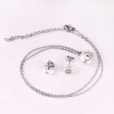 Steel/golden white pearl + anchor cut jewelry set