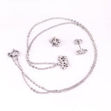 Gold/steel cut crown shape jewelry set with diamonds