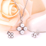 Steel/golden four-flower white pearl+diamond jewelry set