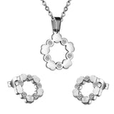 Gold/steel cut jewelry set with diamonds surrounded by many connected clouds