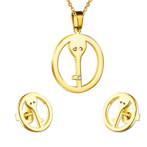 Set of cut jewelry in the shape of a key inside a circle in gold/steel + diamonds