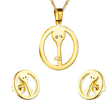 Set of cut jewelry in the shape of a key inside a circle in gold/steel + diamonds