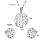 Gold/steel football-like discs with a hollowed-out center, faceted cut jewelry set with no diamonds.