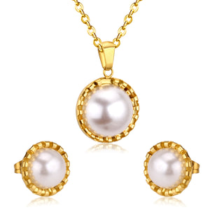 Gold/steel half pearl standing on top of round cake jewelry set