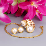 Gold/steel half pearl standing on top of round cake jewelry set