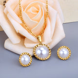 Gold/steel half pearl standing on top of round cake jewelry set