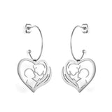 Boucles d'oreilles d'amour maternel creuses en forme de coeur en acier inoxydable à la mode