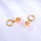 Boucles d'oreilles mode avec visage souriant rond orange plaqué or 18 carats