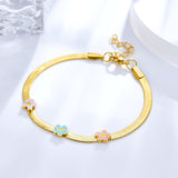 Pulsera de acero con 3 accesorios de flores multicolores