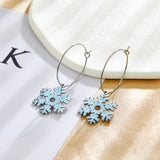 Boucles d'oreilles tendance en forme de flocon de neige en acier inoxydable