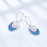 Círculo de moda con aretes ovalados de colores mixtos de agua de mar