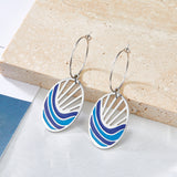 Círculo de moda con aretes ovalados de colores mixtos de agua de mar