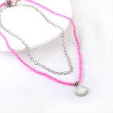 Accesorios de concha de acero inoxidable + collar de cadena doble con cuentas rosas