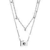 Caméra en acier inoxydable avec diamants + collier double chaîne 5 diamants ronds