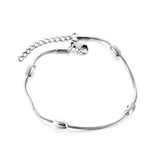 Bracelet en acier inoxydable à 4 accessoires ovales pour femme